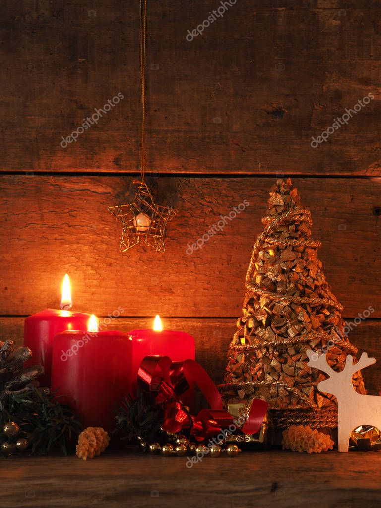 Romantic Christmas background with candle light — Stock Photo