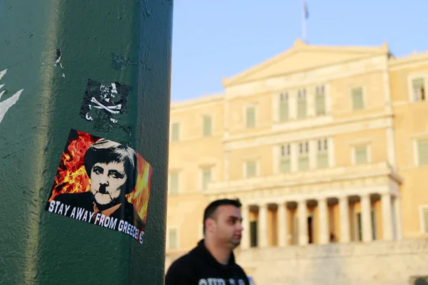 Etiqueta de protesto com o retrato de Merkel — Fotografia de Stock