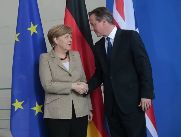 Канцлер Німеччини Ангела Меркель, британським прем'єр-міністр Девід Кемерон — стокове фото