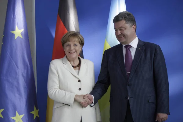 Tysk kansler Angela Merkel og ukrainske præsident Petro Poroshenko - Stock-foto