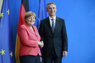  Angela Merkel ve Jens Stoltenberg