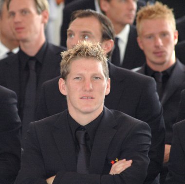 14 Ağustos 2006 - Berlin: Bastian Schweinsteiger sonra Dünya Şampiyonası, Schloss Bellevue, Berlin Alman Milli Futbol Takımı için bir resepsiyonda.