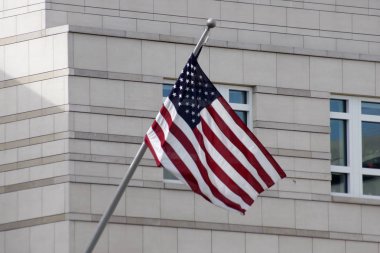 American Flag in front of Embassy  clipart