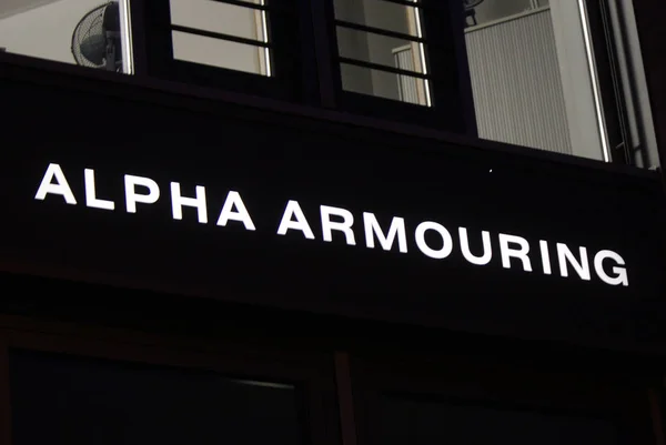 Logo marki "Alpha opancerzenie" — Zdjęcie stockowe