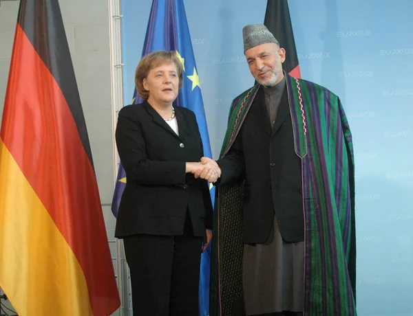 Hamid Kasai, Angela Merkel — Stockfoto