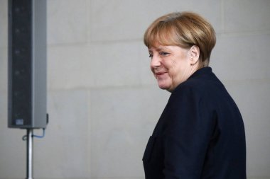 German Chancellor Angela Merkel at a press conference clipart
