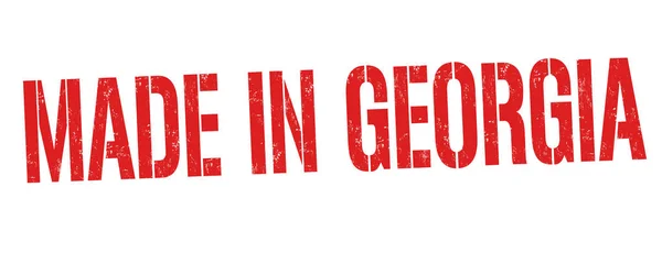 Gemaakt in Georgië teken of stempel — Stockvector
