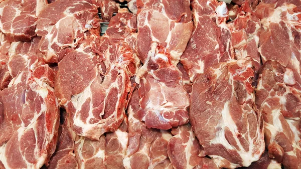 Trozos de carne de cerdo de fondo — Foto de Stock