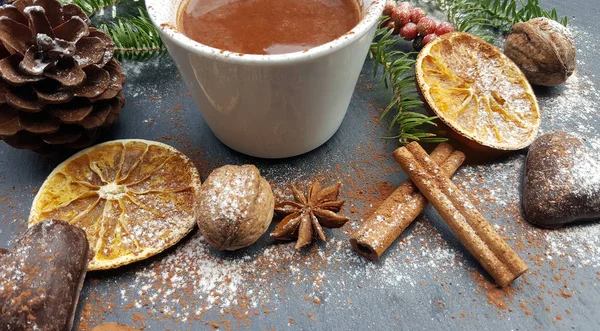Christmas stone background with fir tree, nuts and hot chocolate — Stock Photo, Image