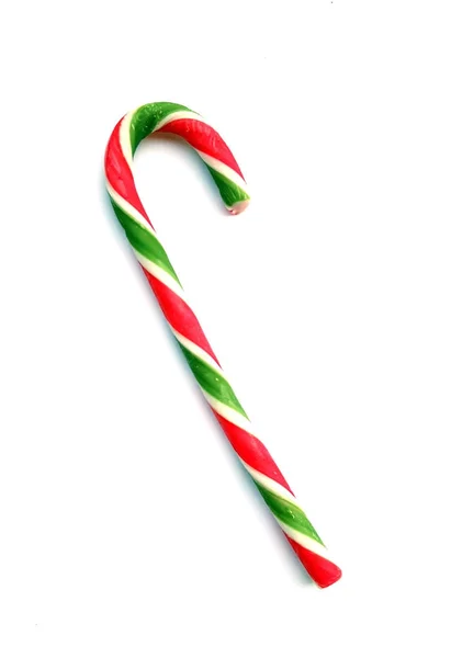 Bastoncino di zucchero natalizio su sfondo bianco — Foto Stock