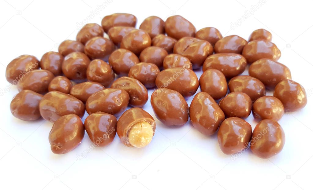 Peanuts in chocolate on a white background