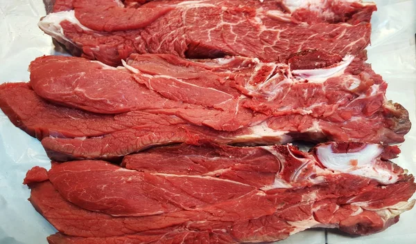 Bife de carne crua fresco fundo — Fotografia de Stock