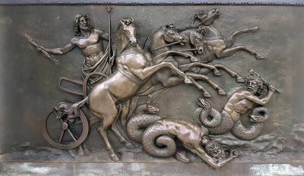 Metallic Panel depicting with Zeus, greek ancient god, in war chariots during battle against evil creatures at Achilleion palace, on Corfu island, Greece