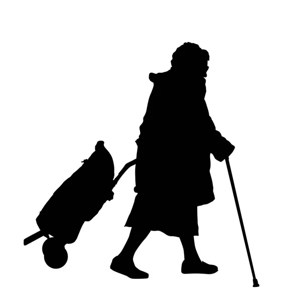 Silhouette einer alten Frau mit Gepäck und Stock — Stockvektor