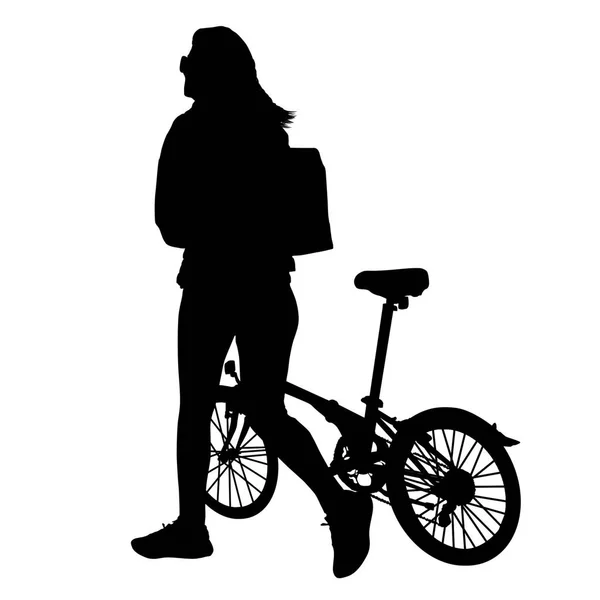 Mujer silueta caminando con bicicleta — Vector de stock