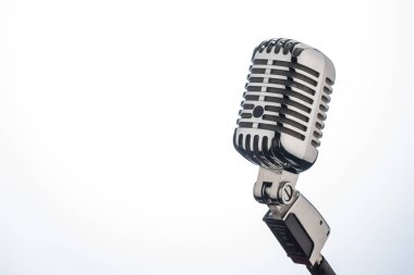 retro microphone in front of a white background clipart