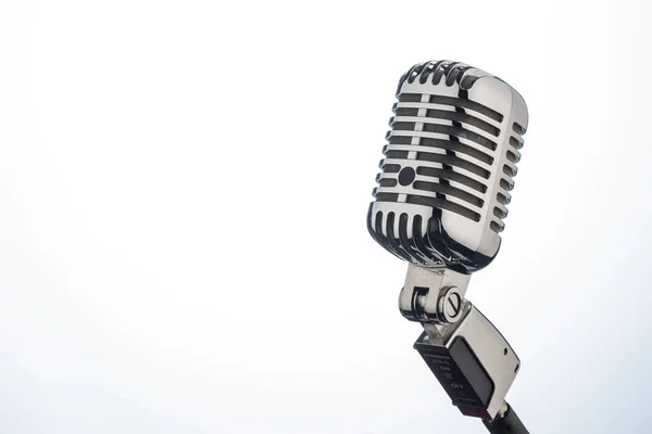 Retro microphone in front of a white background — Stock Photo, Image
