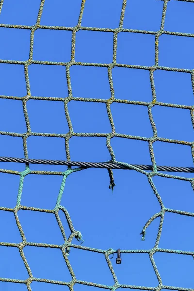 Hole in a net — Stock Photo, Image