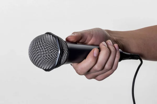 Woman holding microphone — Stock Photo, Image