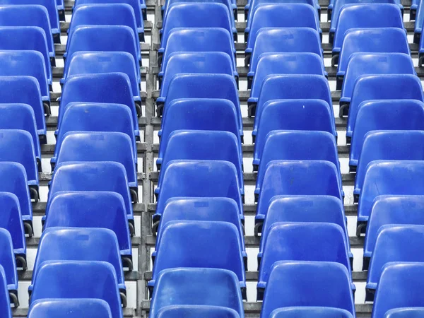 Tribune with blue chairs — Stock Photo, Image
