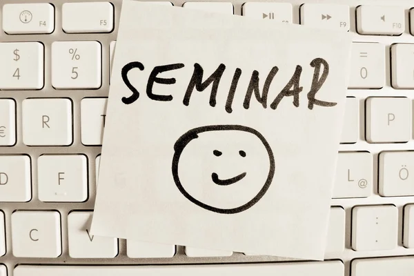 Note on computer keyboard: seminar — Stock Photo, Image