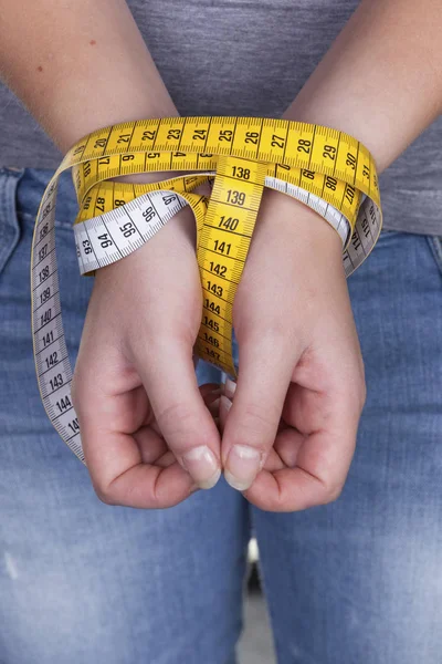 Woman with tape measure before the next diet — Stock Photo, Image