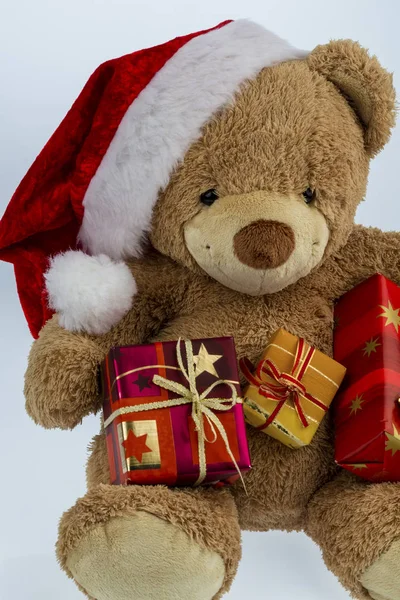 Teddy bear with christmas presents — Stock Photo, Image