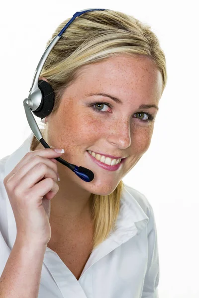 Vrouw met hoofdtelefoon in klantenservice — Stockfoto
