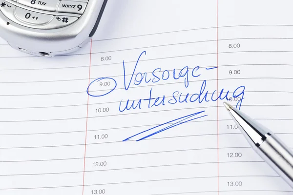 Eintrag in den Kalender: Screening — Stockfoto