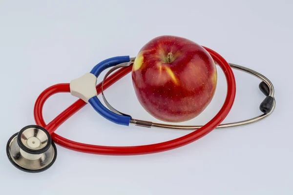 Pomme et stéthoscope — Photo