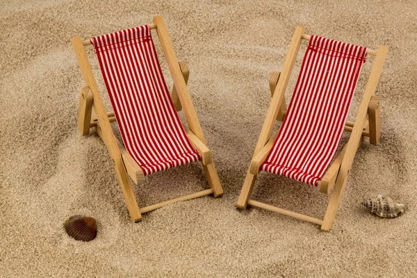 Deck chair on the sandy beach — Stock Photo, Image