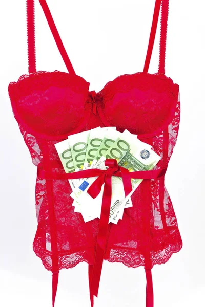 Red lingerie with banknotes — Stock Photo, Image