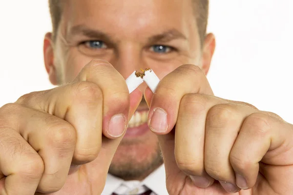 Man breaks cigarette — Stock Photo, Image