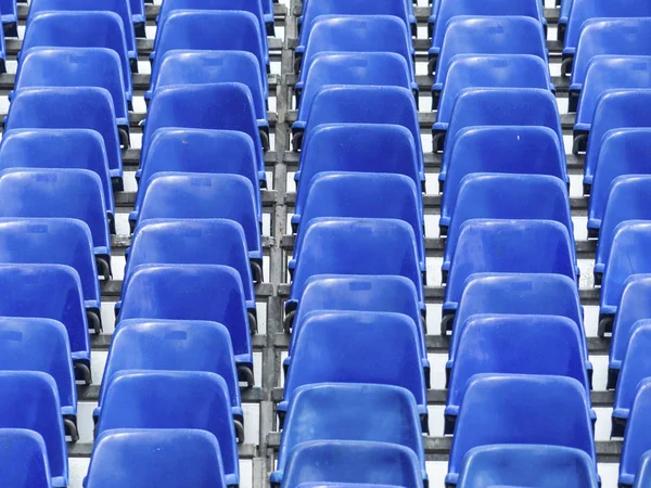 Tribune with blue chairs — Stock Photo, Image