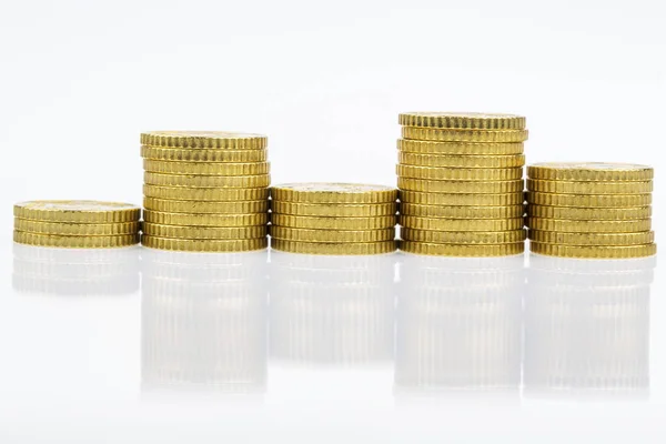 Stacked coins, up and down — Stock Photo, Image