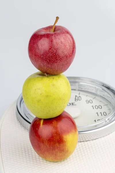 Apples on a balance — Stock Photo, Image