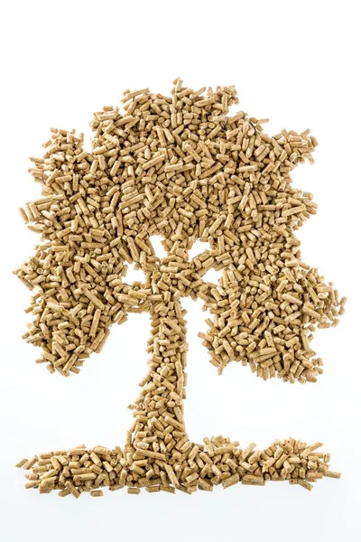 Tree made of pellets for heating and heat — Stock Photo, Image