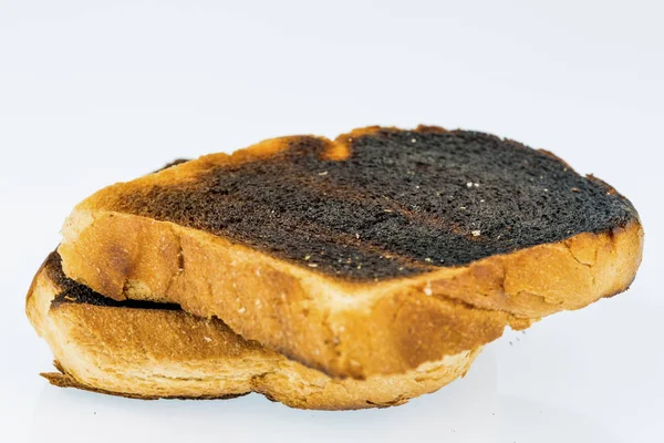 Burnt toast slices of bread — Stock Photo, Image