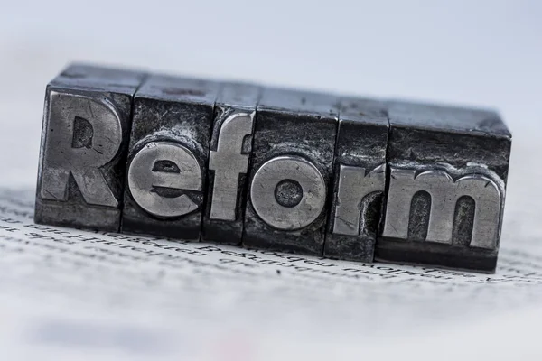 Reform written in lead letters — Stock Photo, Image