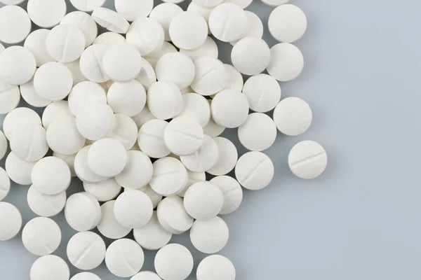 White tablets in abundance — Stock Photo, Image