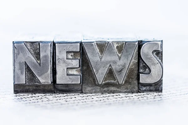 News in lead letters — Stock Photo, Image