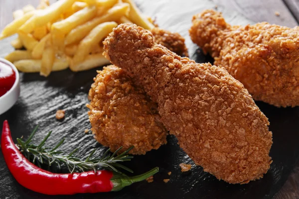 Breaded crispy chicken leg fried french fries  sauce — Stock Photo, Image