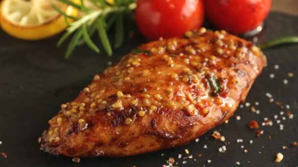 cooking fried roasted chicken breasts cut knife with lemon tomato and rosemary mustard seeds honey 