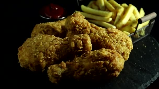 Breaded Crispy Fried Chicken Legs French Fries Sauce Stone Black — Stock Video