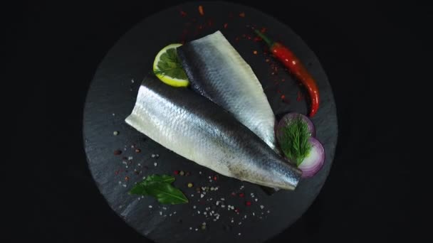 Fish Fillet Herring Spices Black Background Rotation 360 Degrees Top — Stock Video