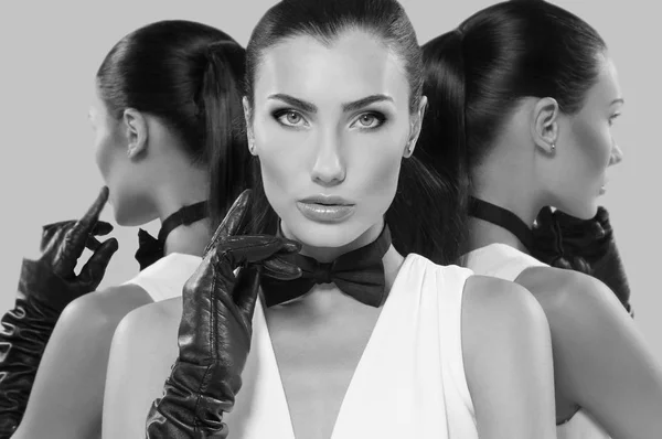 Portret pięknej kobiety Brunetki w eleganckie białe ubrania klasyczne — Zdjęcie stockowe