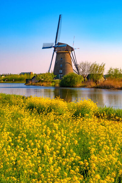 windmills in holland on a sunny day