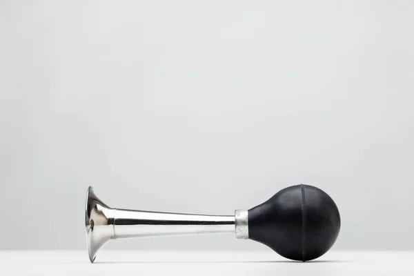 Single horn on white — Stock Photo, Image
