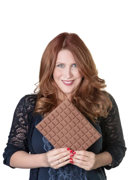 Äta en stor chokladkaka — Stockfoto