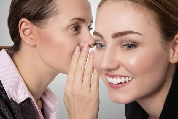 Whispering co-workers — Stock Photo, Image